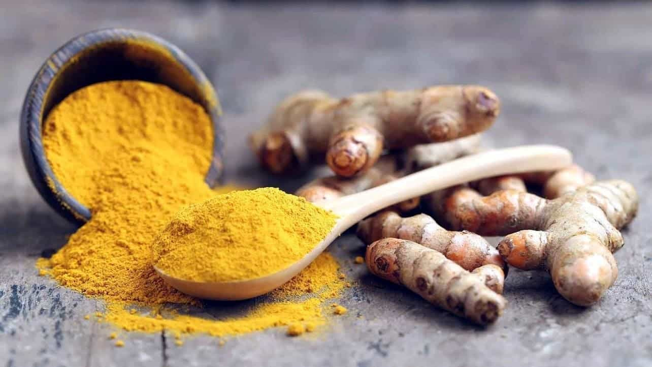 Trị mụn bằng tinh bột nghệ